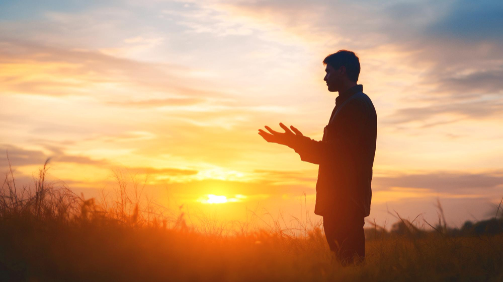 Man praying in the morning
